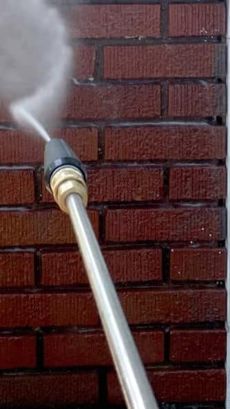 hosing down brickwork